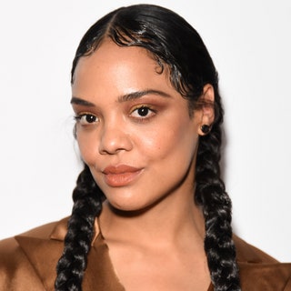 Tessa Thompson on the red carpet with pigtails and swirlstyled baby hair